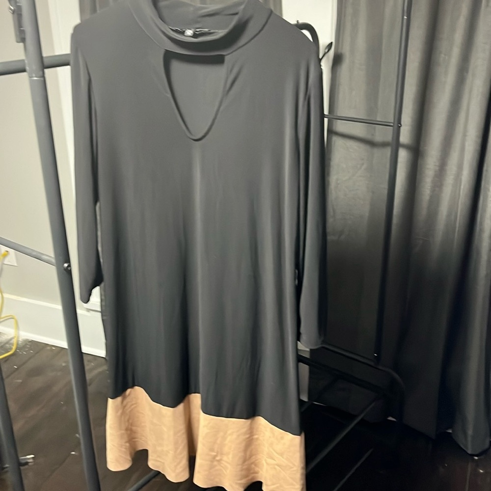 Tiana B. Long sleeve dress.  Black with suede hem. Keyhole neckline. Like new.